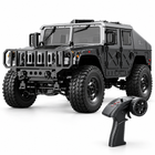 4wd-rc-military-crawler-cannon-winch-ready-swat-black: left-facing three-quarter studio hero with matching controller.