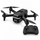 KK1 Quad Air drone right-facing three-quarter hero view with matching controller bottom-right.