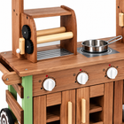 Close detail of the wooden cart's hot-dog roller, grill gears, pan and three turning control knobs.