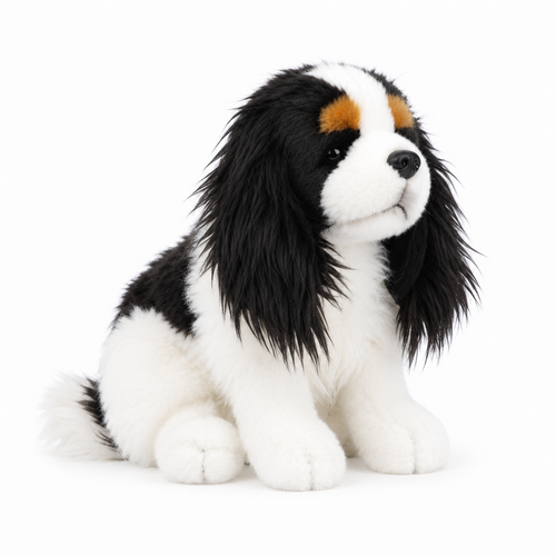Cavalier King Charles Spaniel plush seated in a front-right three-quarter view on white background