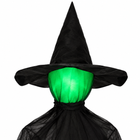 Close-up of the standing witch's pointed hat and colour-changing LED head glowing green