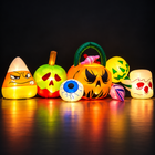 8ft Halloween inflatable set glowing at night with built-in LED lights on a dark studio floor