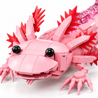 Close-up of the axolotl building block face with black eyes, wide smile and red and pink gills