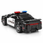 Reobrix police interceptor building set rear three-quarter view with light bar and S.W.A.T. lettering