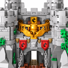 Close-up of the gold winged crest and red shields above the Sword of Holy Spirit castle gate