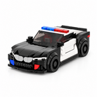 318-piece city police car DIY building bricks on a white studio background