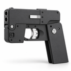 Black IC380 folding phone toy gun left three-quarter studio image