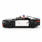 The Urban Defender 318-piece brick police car โ clean side profile on white studio background