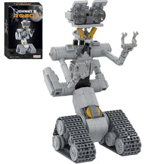 Grey robot building model from the Toylvia 313PCS Playable Robot Set displayed with packaging on a white background