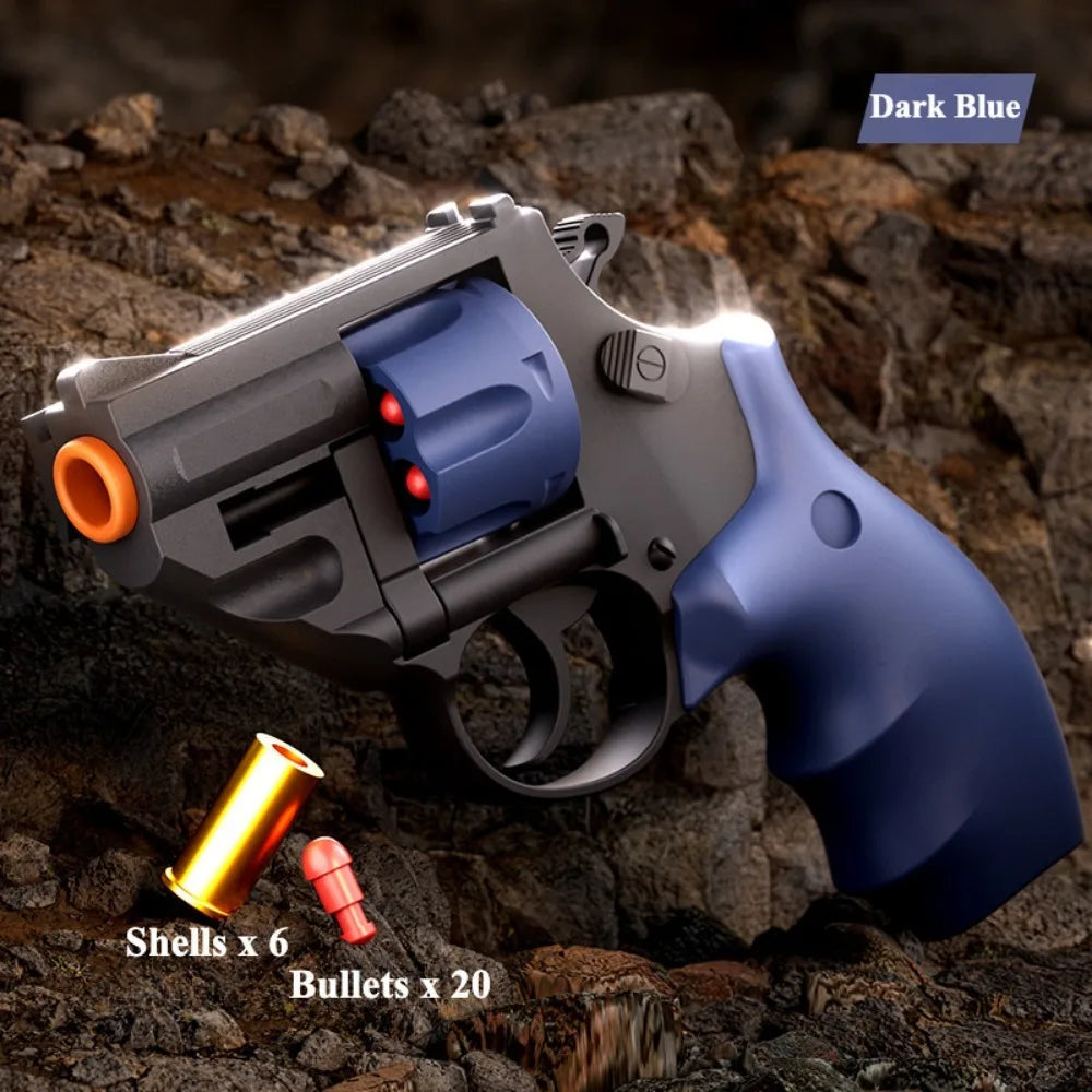 TB-500 Blue Dart Revolver displayed on a rocky surface with shells and soft bullets included.