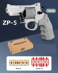 Gray ZP-5 toy revolver with box, shell casings, and soft bullets on a blue background.