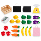Included market stand play accessories with chalkboards, crate, scale and toy fruit and vegetables