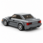 Urban Shadow gray brick coupe rear three-quarter view