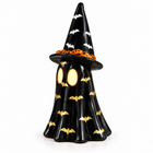 Black ceramic Halloween ghost with gold bats and witch hat, tealight glowing through its eyes