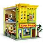 Open-back view of the modular burger restaurant building-block set showing furnished interior floors and storefront.