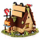 Rear-right three-quarter view of the rustic brick-built cabin with its steep roof, side wall and landscaped base.