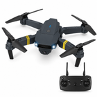Foldable RC quadcopter drone with twin-antenna controller on a white background