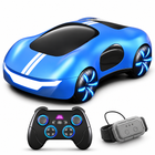gesture-control-rc-stunt-car-spray-usbc-kids-toy: left-facing three-quarter studio hero with matching controller.