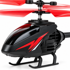 Close-up of the red and black RC helicopter's canopy, side vents, red graphic, and coaxial rotor mast.