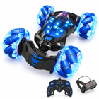 gesture-sensing-rc-stunt-car-hand-controlled-toy-kids: left-facing three-quarter studio hero with matching controller.