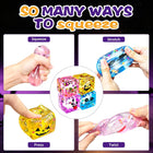 An adult holding and palming two squishy cubes simultaneously for workplace anxiety and stress relief.