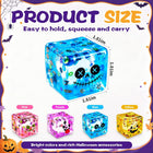 Close-up view of the printed festive Halloween character faces and smooth square cube surface.
