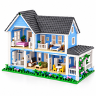Open-back view of the blue cottage building-block house showing furnished rooms across multiple floors.