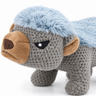 Crochet grey plush dog macro close-up of the face and blue fur
