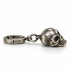 Side profile of the dark punk skull keychain with spring clasp
