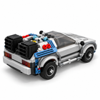 Rear-left three-quarter view of the gray brick-built time-machine sports car, showing the rear machinery and blue details.