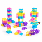 Squishy jelly building blocks built into a tower, two robots and a crocodile in translucent colours