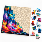 Mystical Ghost Forest wooden jigsaw puzzle partly assembled, with loose animal-shaped wooden pieces beside it