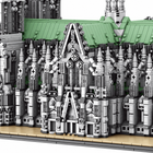 Close-up of the Cologne Cathedral model's ornate Gothic entrance, sage-green roof, and brick-built facade