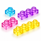 Squishy jelly building bricks close-up: 1, 2, 3 and 4 stud translucent bricks