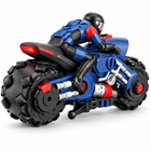 scale-rc-stunt-drift-motorcycle-omni-wheels-rider-blue: distinct supporting studio angle.