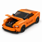 Track Titan orange brick race car with the bonnet open showing the brick engine