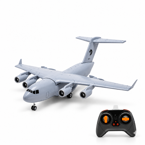 C-17 RC transport aircraft with its remote controller on a white studio floor