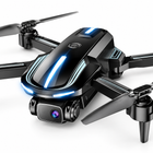 Close-up of the black foldable drone's front camera lens and blue LED trim