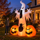 11.8-foot inflatable ghost spider and two pumpkins beside an adult for scale at dusk, hands not visible