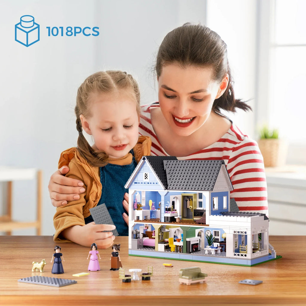 Woman and child playing with a dollhouse and building blocks on a table.