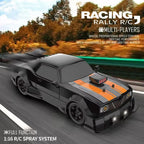Black and orange racing RC car on a track with scenic background