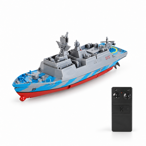 Mini RC frigate warship with its remote controller on a white studio floor