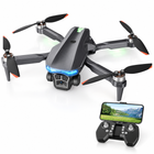 Charcoal folding drone with blue lights and its phone-mounted controller at bottom right.