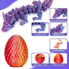 Macro photograph showing a hands twisting open a textured scaled dragon egg revealing a coiled flexible dragon inside.