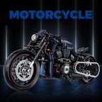 Toy motorcycle model on a dark background with 'MOTORCYCLE' text above.