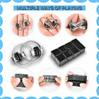 Adult hand holding and toggling the switches and smooth worry-stone depression of the sensory fidget cube.