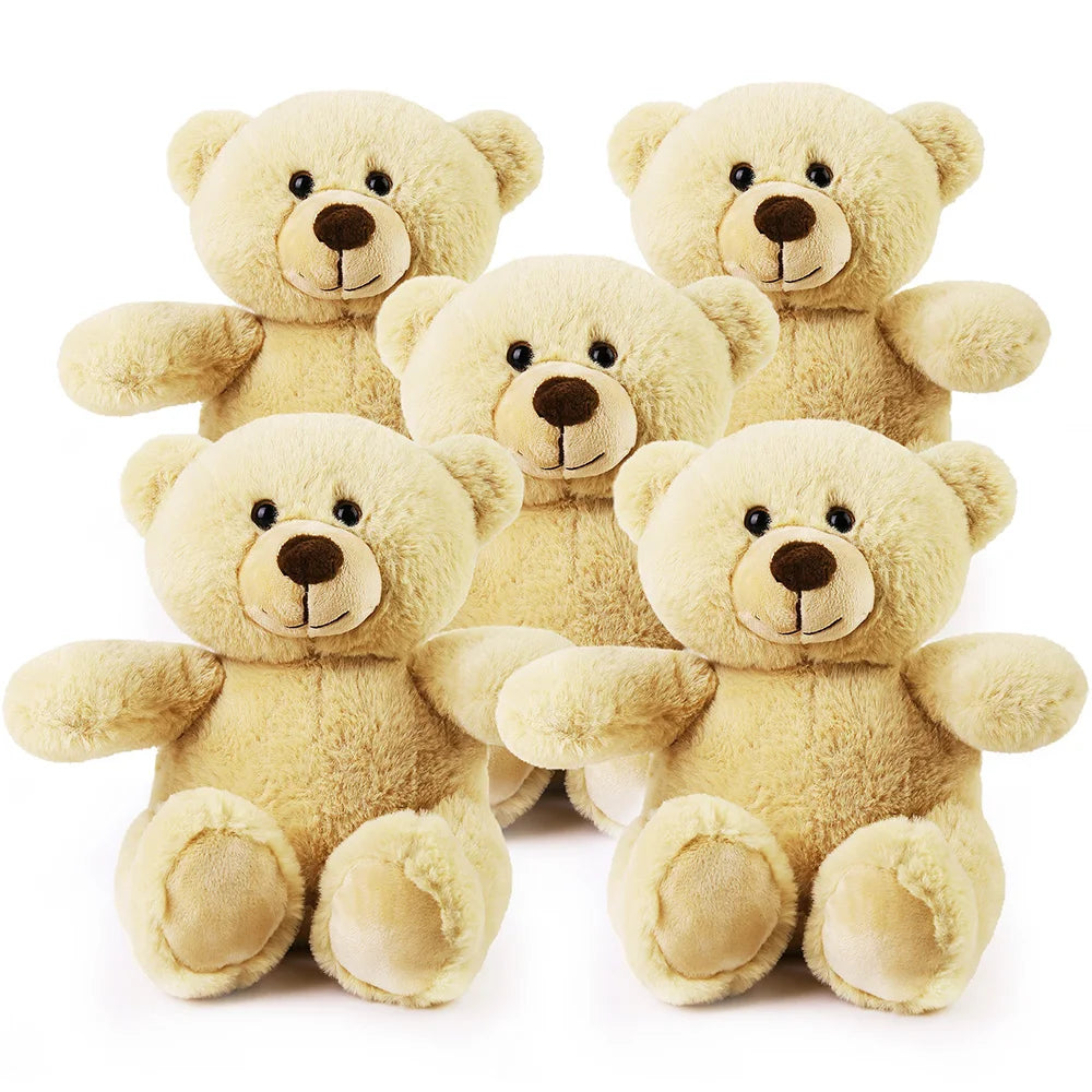 Five plush teddy bears stacked on a white background