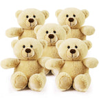 Five plush teddy bears stacked on a white background