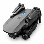 E88 foldable RC drone shown from an alternate folded angle on a white background.