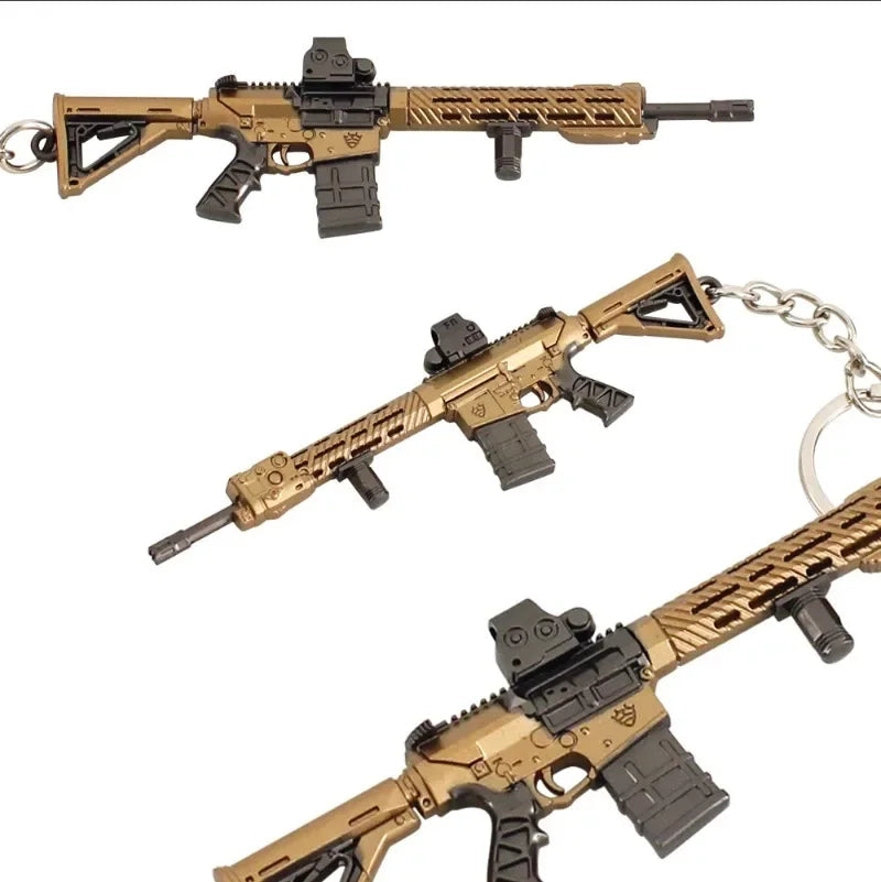 Mini M110 gold and black rifle keychain model displayed on a white background Main image